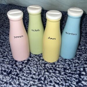 Set of 4 milk bottle coin banks